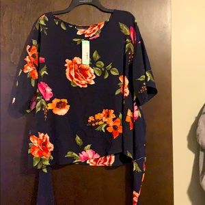 Floral blouse. Ties in back